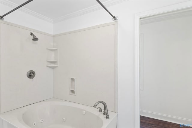 bathroom with ornamental molding, wood-type flooring, and  shower combination