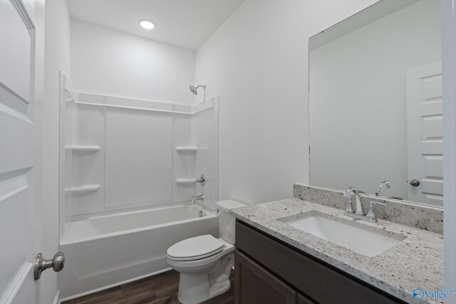 6219 Taramore Ln NW, Huntsville, AL 35806 - full bathroom featuring toilet, shower / bathing tub combination, vanity, and wood finished floors