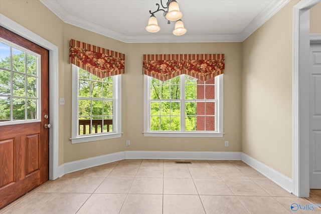 unfurnished dining area with a chandelier, plenty of natural light, ornamental molding, light tile patterned floors, and baseboards