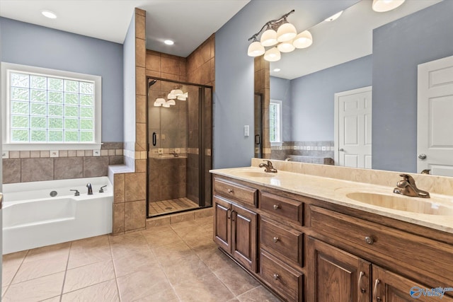 full bathroom with a garden tub, a stall shower, tile patterned flooring, and double vanity