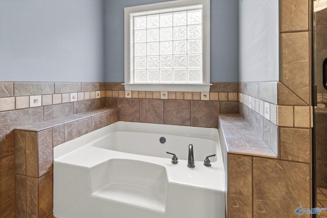 bathroom featuring a garden tub