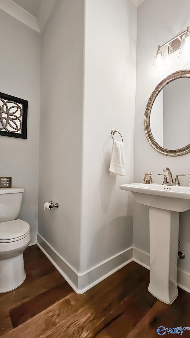 17583 Maree Dr, Athens, AL 35613 - half bath featuring baseboards, toilet, and wood finished floors