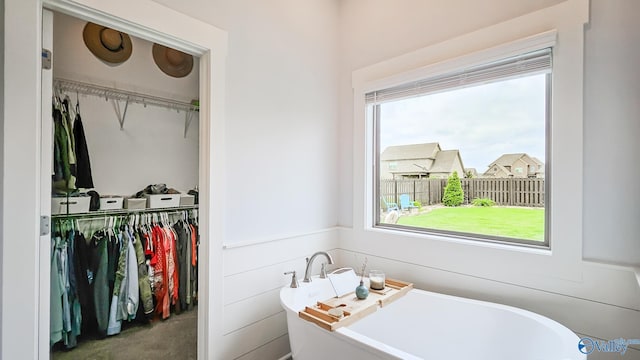 17583 Maree Dr, Athens, AL 35613 - full bath with a wealth of natural light, a freestanding tub, and a walk in closet