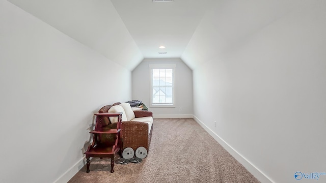 17583 Maree Dr, Athens, AL 35613 - living area featuring lofted ceiling, carpet flooring, and baseboards