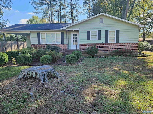 ranch-style home with a front lawn