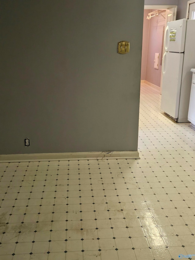 interior details featuring white refrigerator