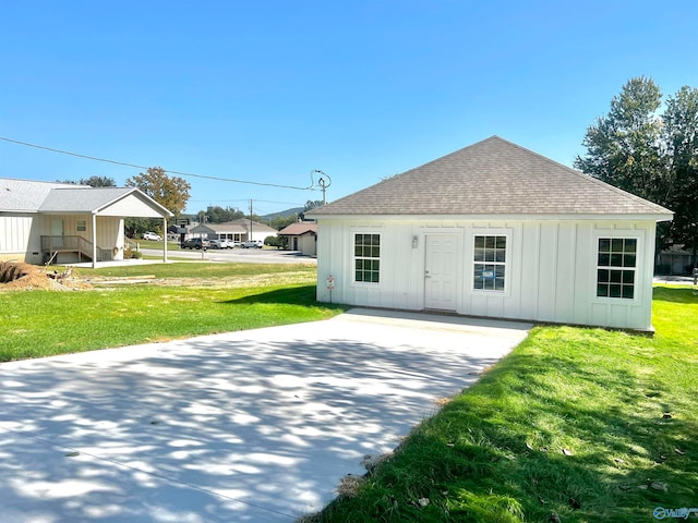 exterior space with a front lawn