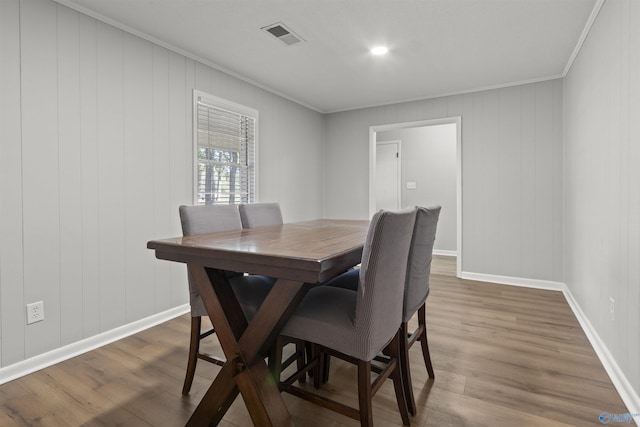 3374 Old Moulton Rd SW, Decatur, AL 35603 - dining area featuring ornamental molding and dark wood-style flooring