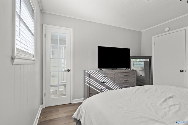 3374 Old Moulton Rd SW, Decatur, AL 35603 - bedroom featuring ornamental molding and wood finished floors