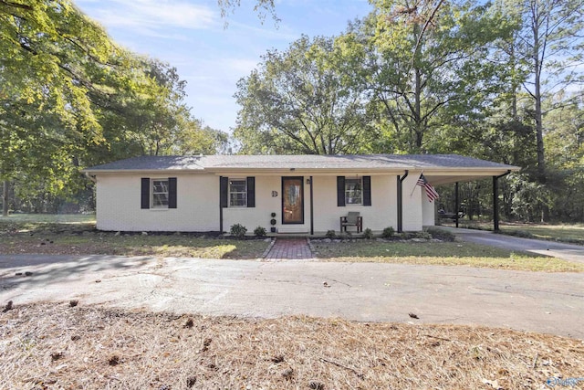 3374 Old Moulton Rd SW, Decatur, AL 35603 - single story home with driveway, an attached carport, and a porch