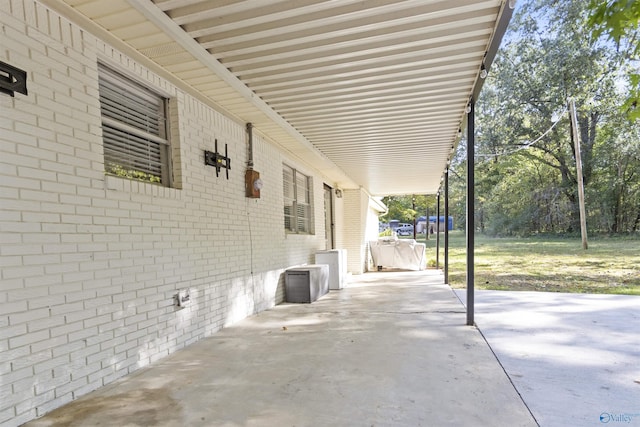 3374 Old Moulton Rd SW, Decatur, AL 35603 - view of patio / terrace featuring an attached carport