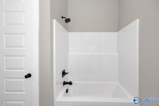 bathroom featuring washtub / shower combination