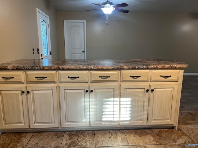 kitchen featuring ceiling fan