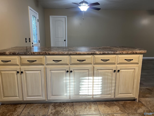 1020 County Road 92, Cedar Bluff, AL 35959 - kitchen featuring ceiling fan, stone finish flooring, and baseboards