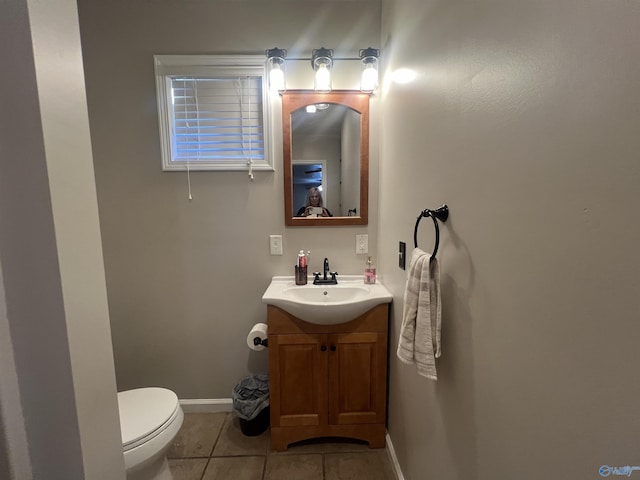 1020 County Road 92, Cedar Bluff, AL 35959 - half bathroom featuring toilet, tile patterned flooring, vanity, and baseboards