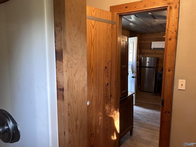 1020 County Road 92, Cedar Bluff, AL 35959 - corridor with hardwood / wood-style flooring, a wall unit AC, and wood walls