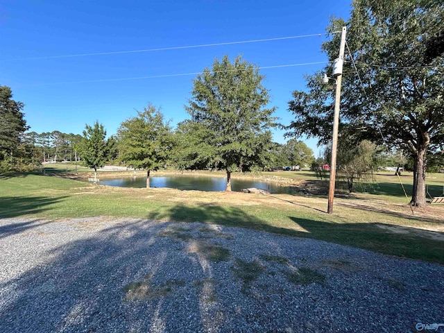 view of yard with a water view