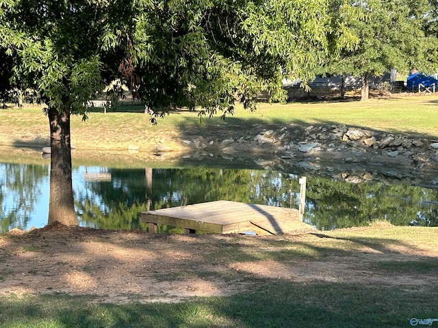 exterior space with a water view