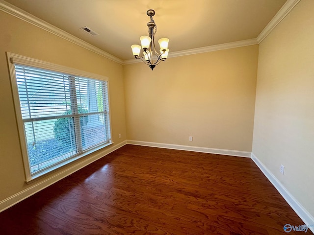 empty room with dark wood-style floors, visible vents, an inviting chandelier, ornamental molding, and baseboards