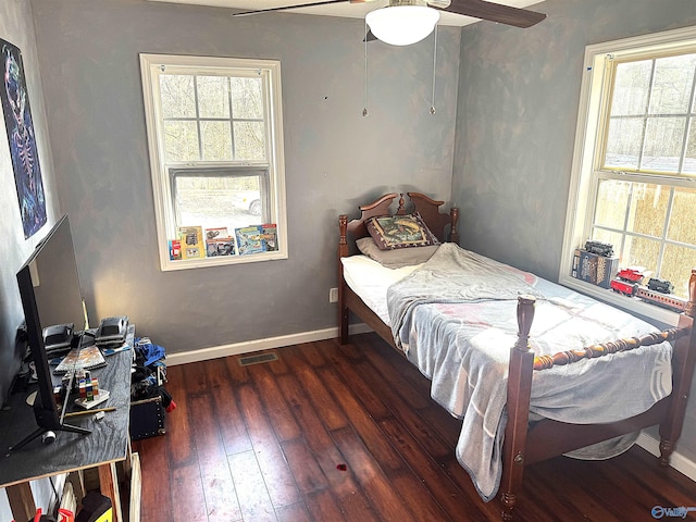 bedroom featuring dark hardwood / wood-style floors and ceiling fan