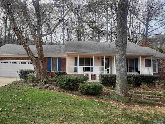 single story home featuring a porch, a garage, brick siding, driveway, and a front lawn