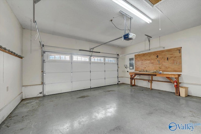 garage with electric panel and a garage door opener