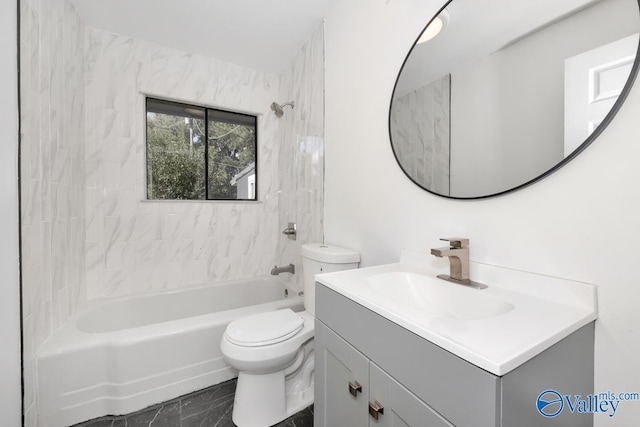 bathroom featuring vanity, shower / bathtub combination, and toilet