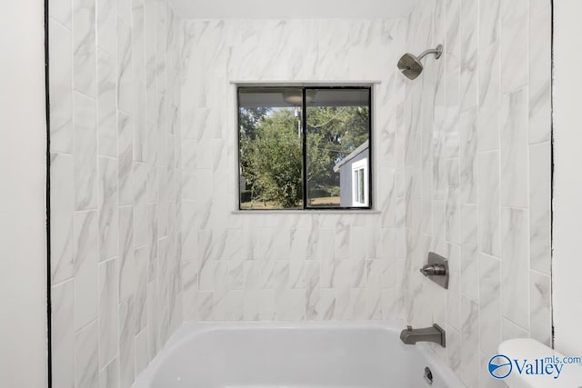 full bathroom with toilet and tub / shower combination
