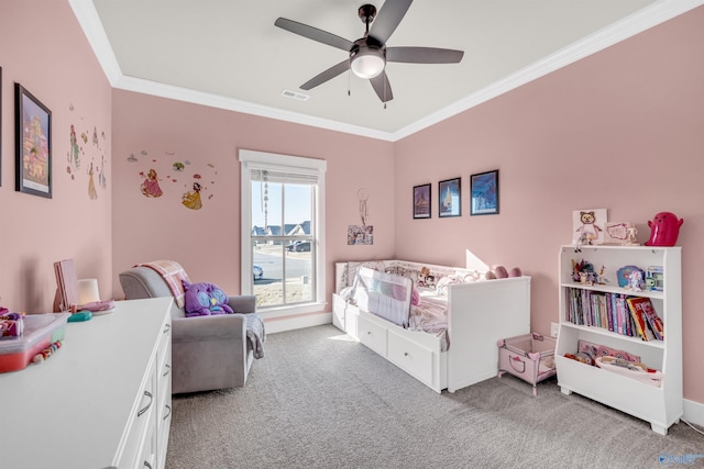 carpeted bedroom featuring crown molding and ceiling fan