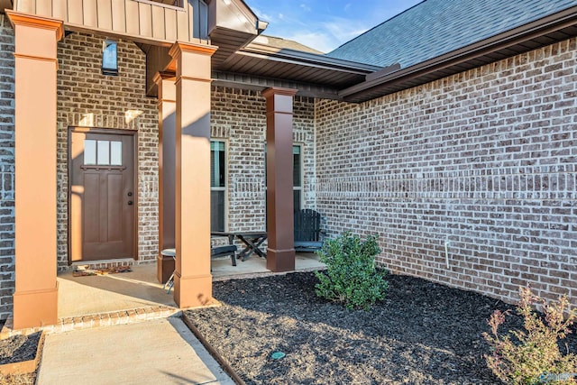 entrance to property with a patio