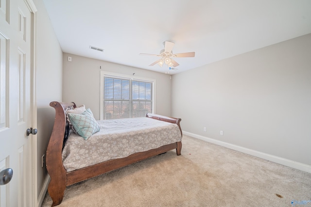 26409 Pepper Rd, Athens, AL 35613 - carpeted bedroom with baseboards, ceiling fan, and visible vents