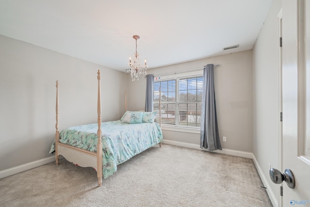 26409 Pepper Rd, Athens, AL 35613 - bedroom featuring an inviting chandelier, carpet flooring, baseboards, and visible vents