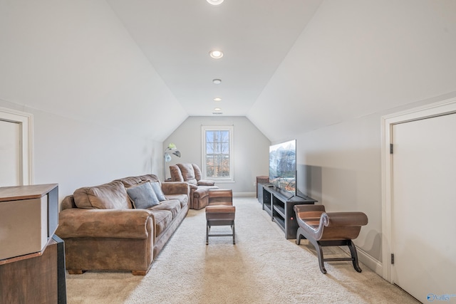 26409 Pepper Rd, Athens, AL 35613 - living room with vaulted ceiling, baseboards, and light colored carpet