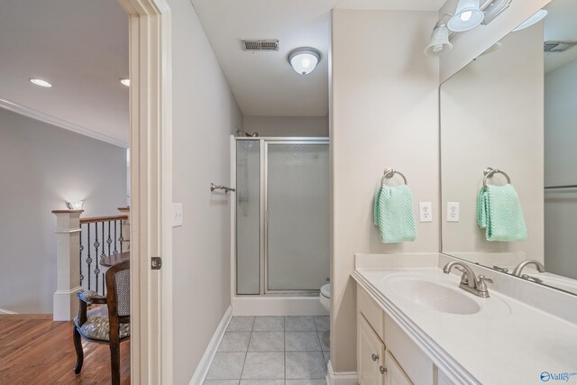 26409 Pepper Rd, Athens, AL 35613 - bathroom featuring vanity, visible vents, toilet, and a shower stall