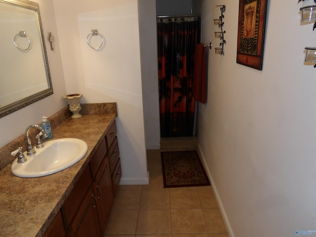 784 County Road 33, Fyffe, AL 35971 - bathroom featuring vanity, tile patterned floors, baseboards, and a shower with shower curtain