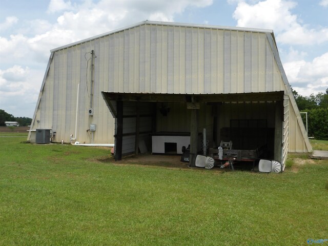 784 County Road 33, Fyffe, AL 35971 - view of pole building with a lawn and cooling unit