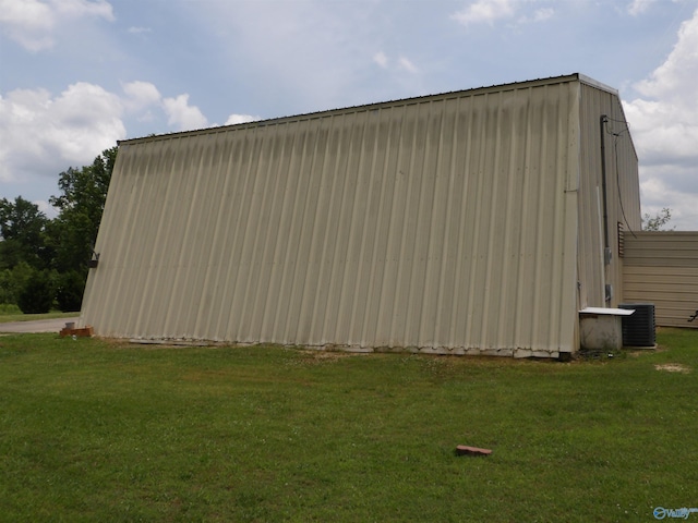 784 County Road 33, Fyffe, AL 35971 - view of home's exterior with a lawn and central air condition unit