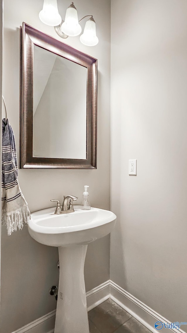 bathroom featuring baseboards