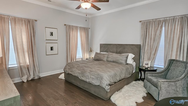 bedroom featuring crown molding, baseboards, dark wood-style flooring, and ceiling fan