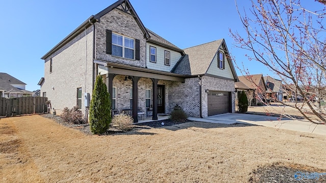 view of front of home featuring brick siding, fence, concrete driveway, covered porch, and an attached garage