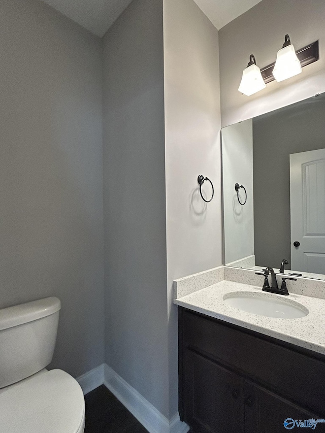 4359 Willow Bend Ln SE, Owens Cross Roads, AL 35763 - half bathroom featuring toilet and vanity