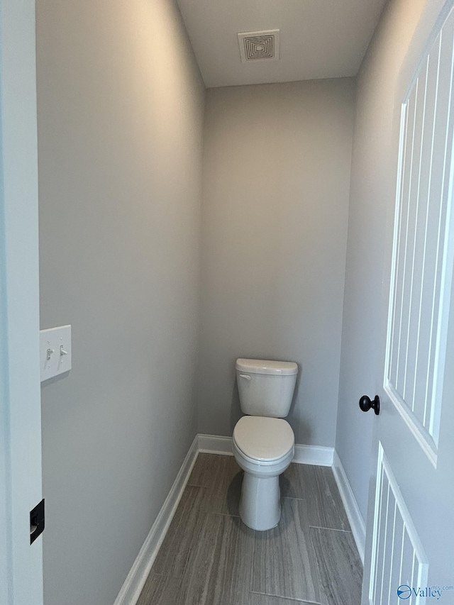 4359 Willow Bend Ln SE, Owens Cross Roads, AL 35763 - bathroom featuring toilet and baseboards
