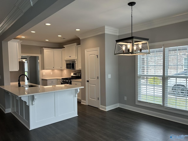 4359 Willow Bend Ln SE, Owens Cross Roads, AL 35763 - kitchen with appliances with stainless steel finishes, healthy amount of natural light, crown molding, white cabinets, and recessed lighting