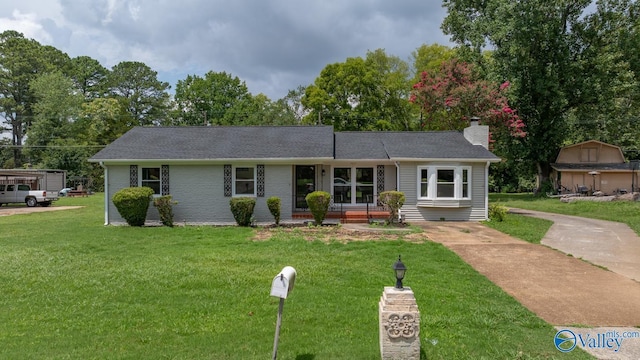 2017 Shady Lane Dr, Huntsville, AL 35810 - ranch-style house with a front lawn