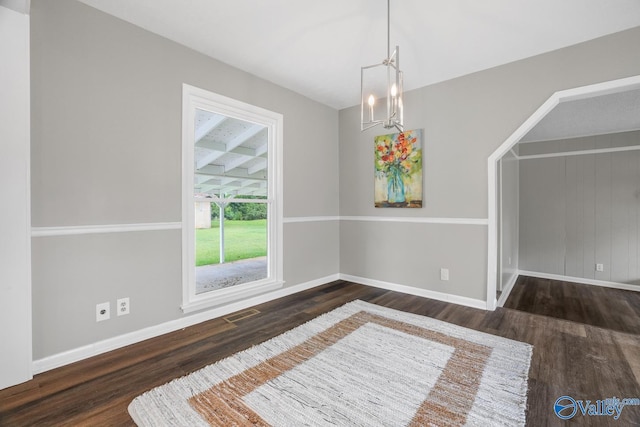 2017 Shady Lane Dr, Huntsville, AL 35810 - dining room featuring dark wood-type flooring and an inviting chandelier