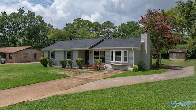 2017 Shady Lane Dr, Huntsville, AL 35810 - single story home with a storage unit and a front yard