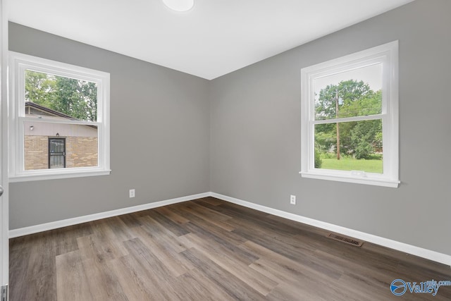2017 Shady Lane Dr, Huntsville, AL 35810 - empty room with hardwood / wood-style flooring and a wealth of natural light