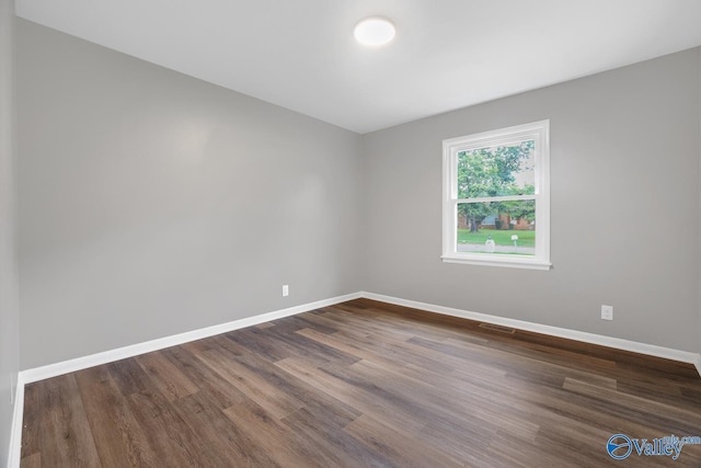 2017 Shady Lane Dr, Huntsville, AL 35810 - empty room featuring dark wood-type flooring