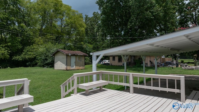 2017 Shady Lane Dr, Huntsville, AL 35810 - wooden terrace featuring a lawn and a storage unit