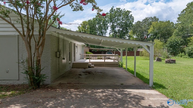 2017 Shady Lane Dr, Huntsville, AL 35810 - view of parking / parking lot featuring a carport and a lawn